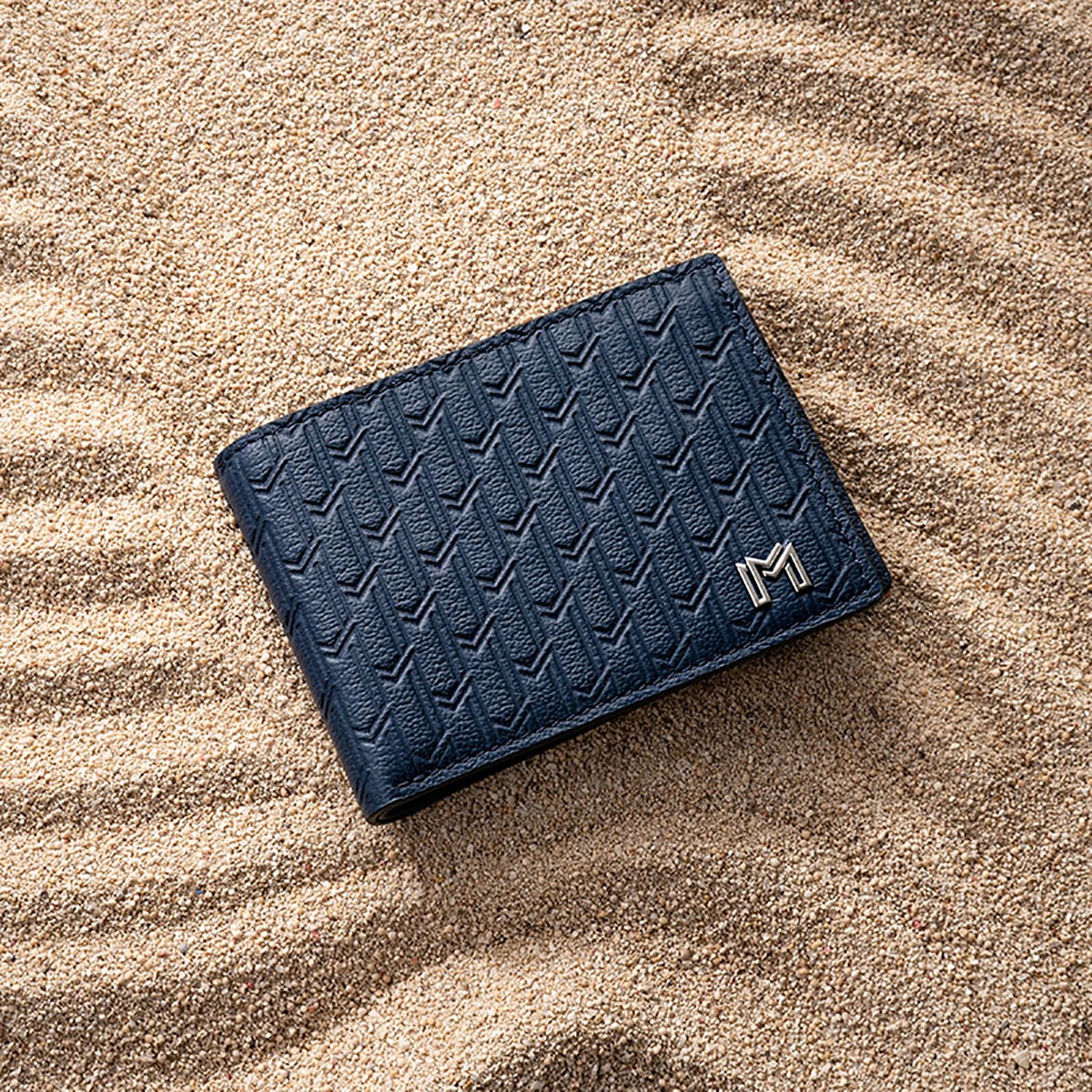 جلد الجمل كحلي / فضي