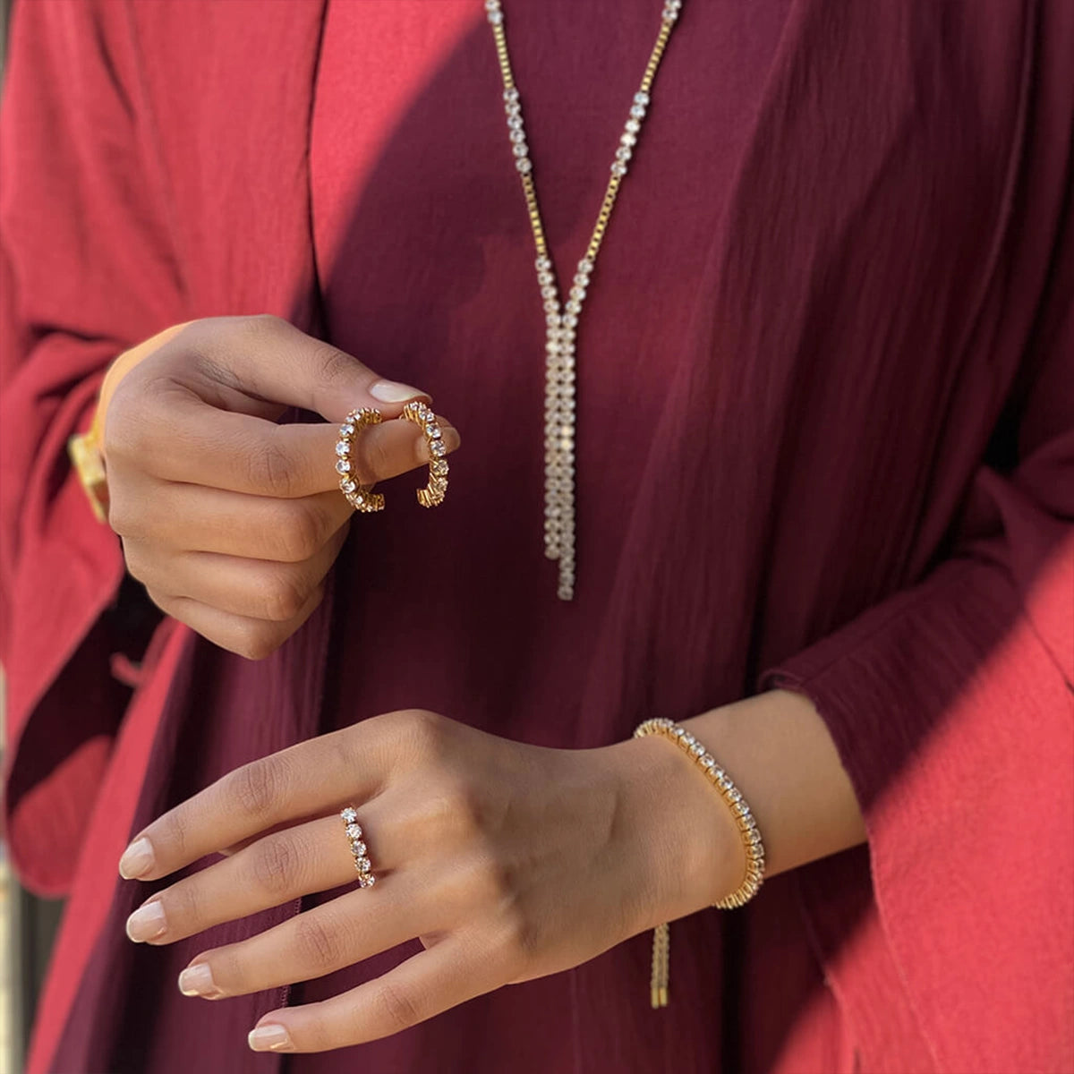 تنس / أقراط باللون الذهبي